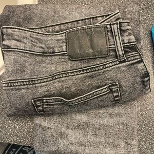 American Eagle black acid wash flex jeans